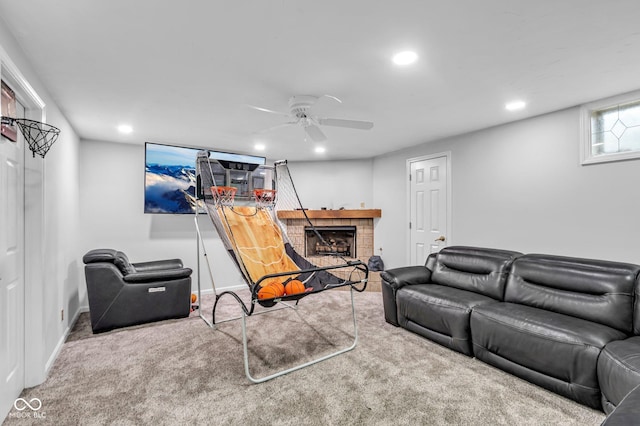 carpeted living room with ceiling fan