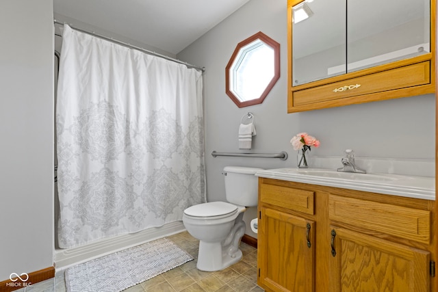 full bathroom with vanity, toilet, and shower / tub combo