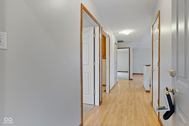 hallway featuring light hardwood / wood-style floors