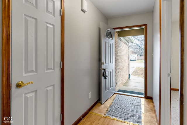 entryway featuring light tile patterned floors