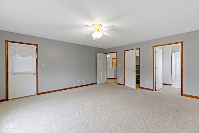 empty room with light carpet and ceiling fan