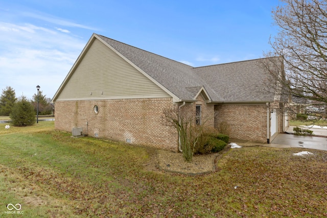 view of property exterior featuring a yard and central air condition unit