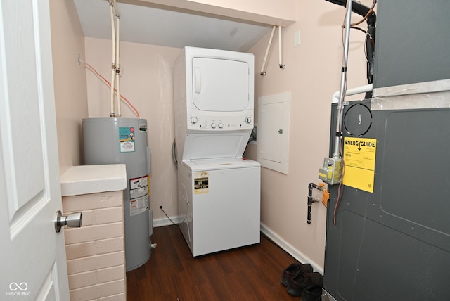 washroom with electric water heater, stacked washer / drying machine, dark wood-type flooring, and heating unit