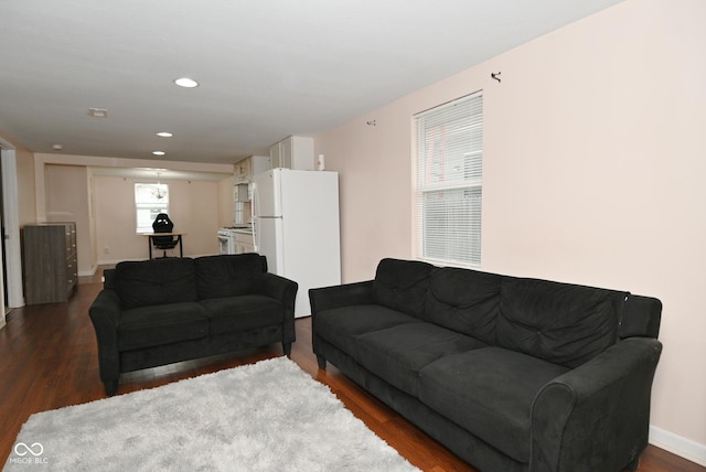 living room featuring dark hardwood / wood-style floors