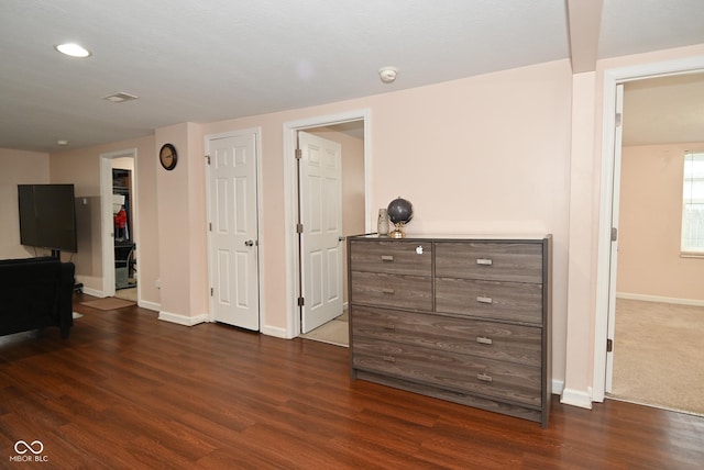 interior space with dark wood-type flooring