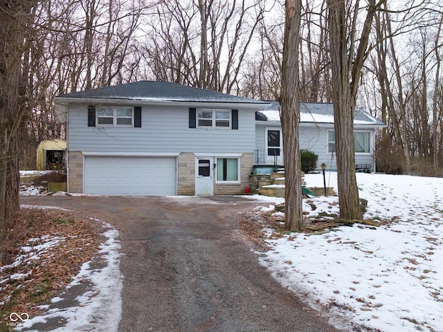 view of front of property with a garage