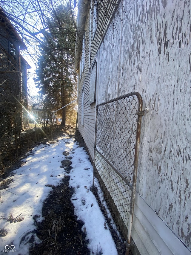 view of snow covered property