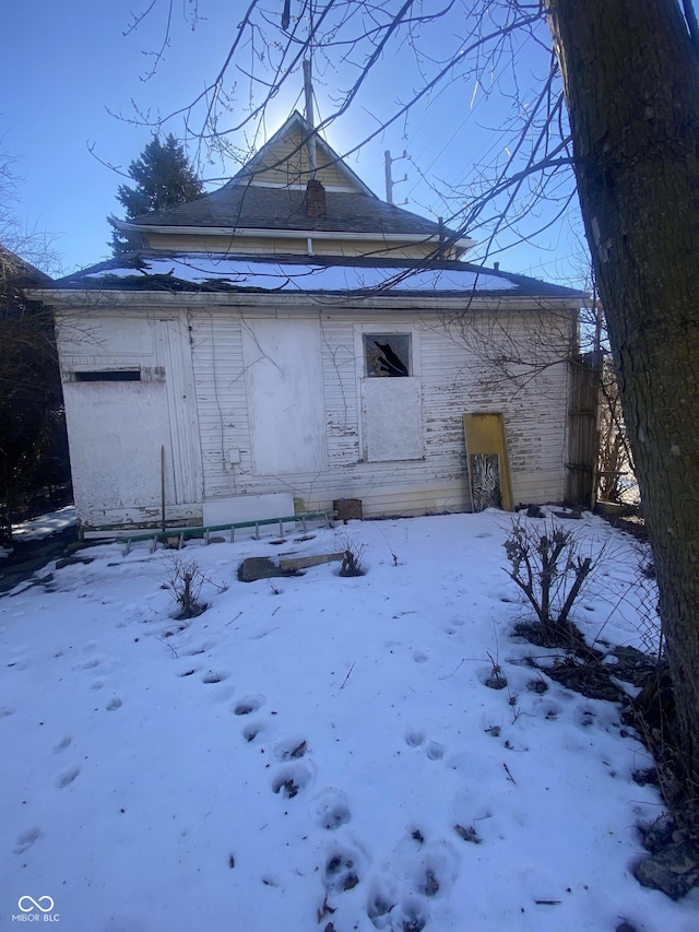 view of snow covered property