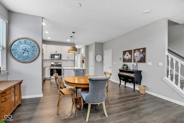 dining room featuring dark wood-type flooring