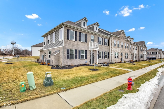 view of front of property with a front lawn