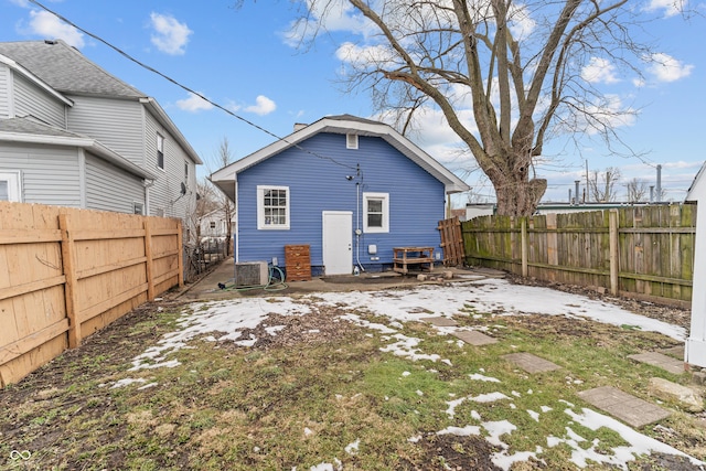 back of property featuring central air condition unit