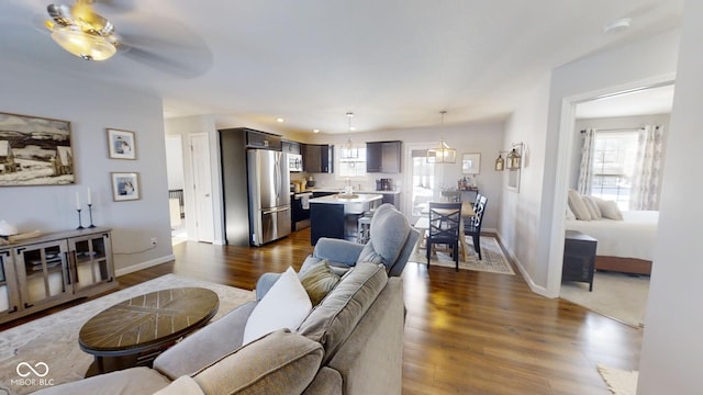 living room featuring dark wood-type flooring