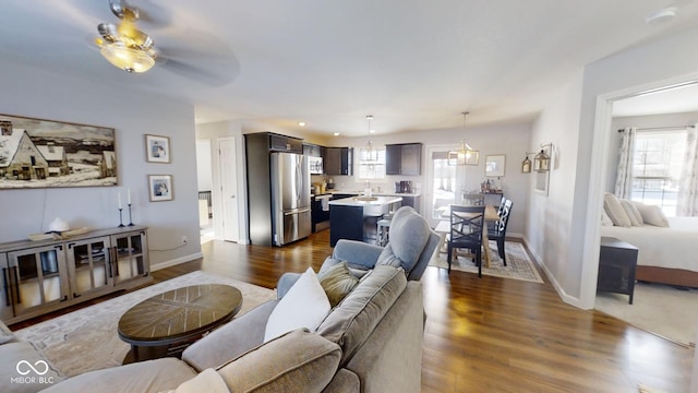 living room featuring dark wood-type flooring