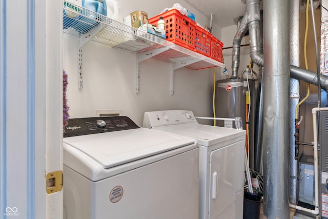 washroom featuring independent washer and dryer