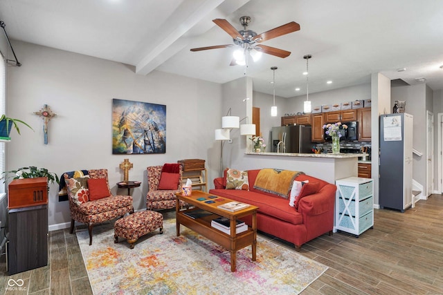 living room with beam ceiling and ceiling fan