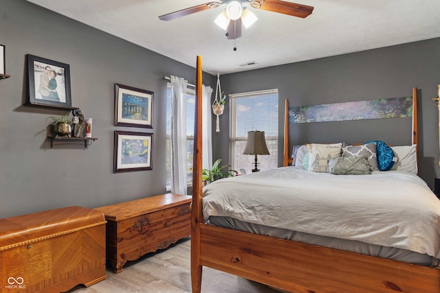 bedroom featuring ceiling fan and light wood-type flooring