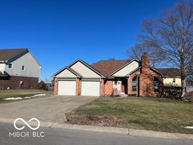 single story home featuring a garage and a front yard