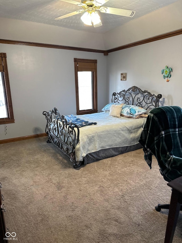 bedroom featuring ceiling fan and carpet floors