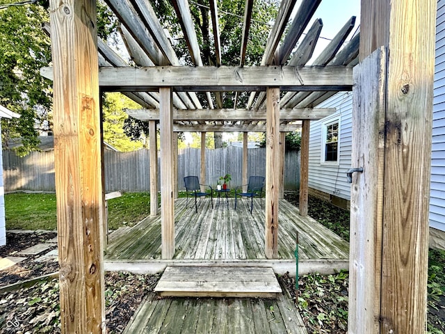 wooden deck featuring a pergola