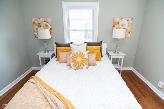 bedroom featuring dark hardwood / wood-style floors