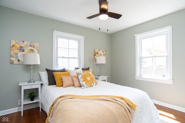 bedroom featuring dark wood-type flooring and ceiling fan