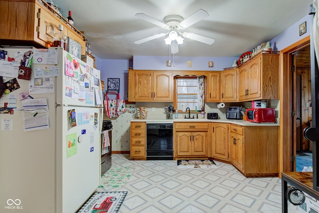 kitchen featuring sink, ceiling fan, dishwasher, stove, and white fridge