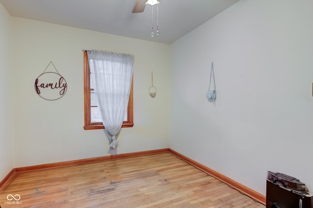 unfurnished room featuring ceiling fan and light hardwood / wood-style flooring