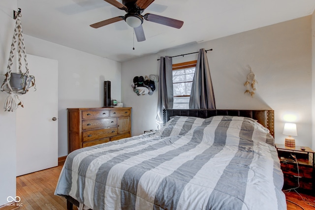 bedroom featuring light hardwood / wood-style flooring and ceiling fan