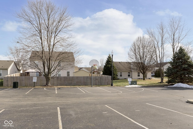 view of parking / parking lot with basketball court