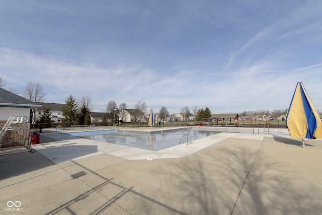 view of pool featuring a patio