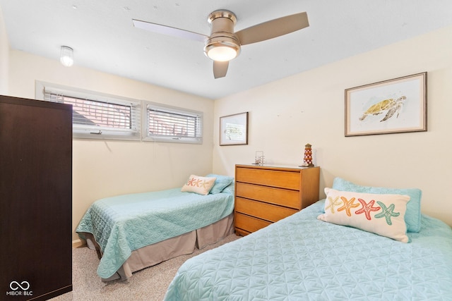 bedroom with carpet and ceiling fan