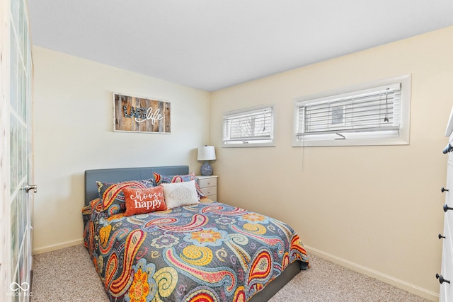 bedroom with light carpet