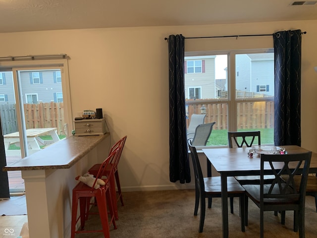 view of carpeted dining room