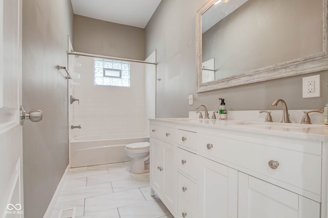 full bathroom featuring vanity, toilet, and tiled shower / bath combo