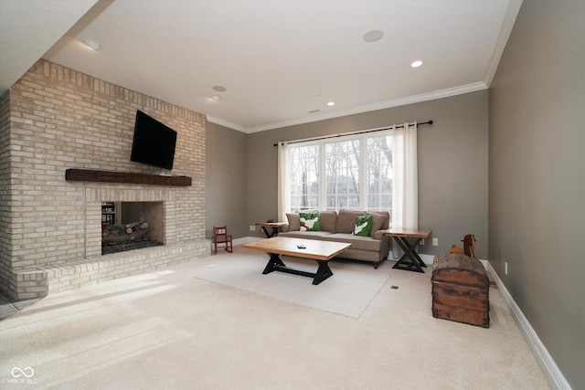 living room featuring ornamental molding, a brick fireplace, and carpet