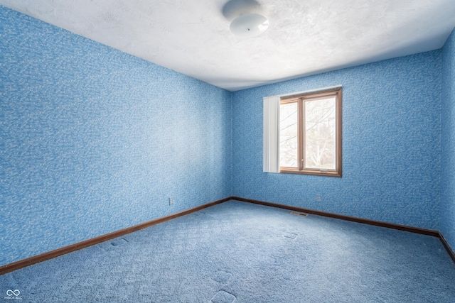 empty room with carpet floors