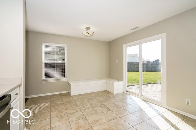 interior space with light tile patterned floors