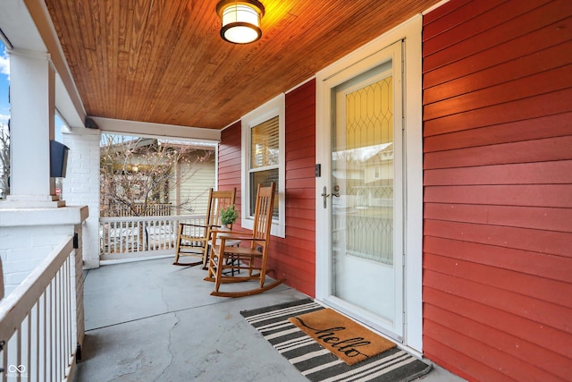 entrance to property with a porch