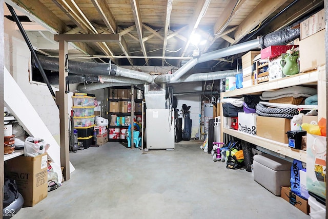 unfinished basement featuring heating unit