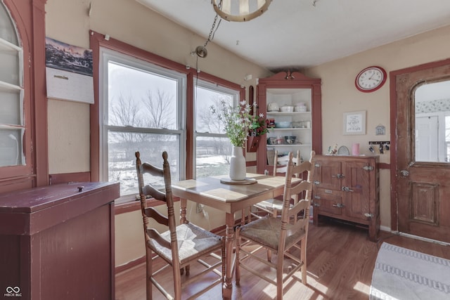 dining space featuring hardwood / wood-style floors