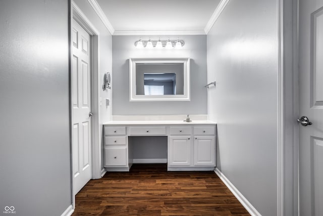 bathroom featuring crown molding, vanity, and wood-type flooring