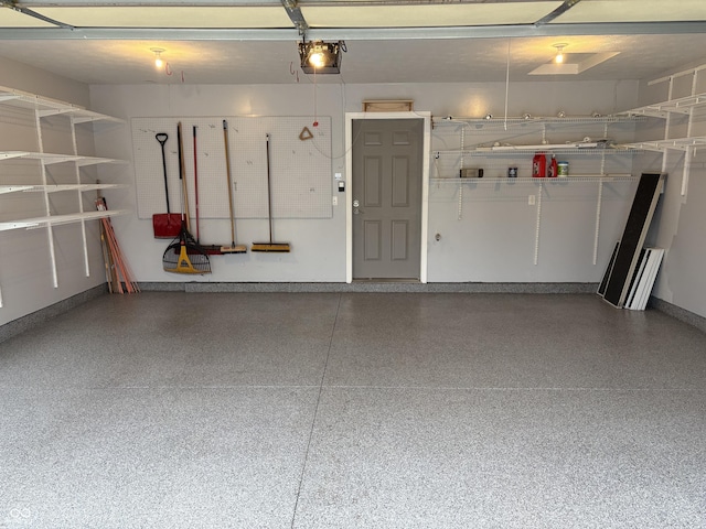 garage featuring a garage door opener