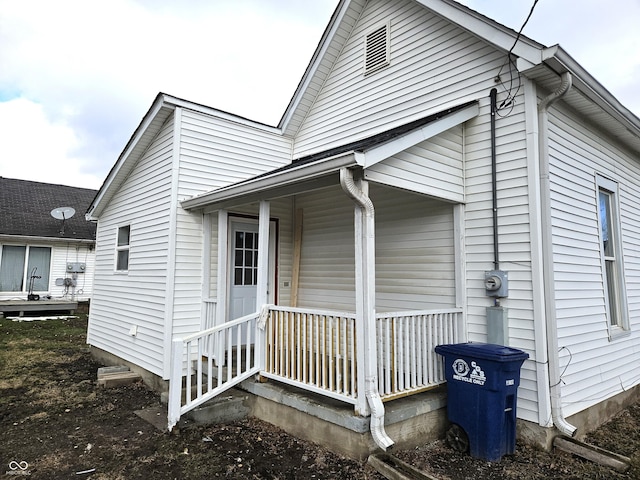 view of home's exterior with covered porch