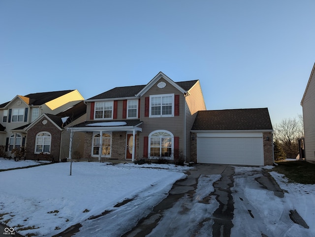 view of front of property featuring a garage