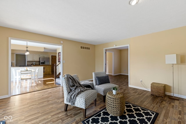 956 Dorchester Dr, Noblesville, IN 46062 - living area featuring wood-type flooring and baseboards