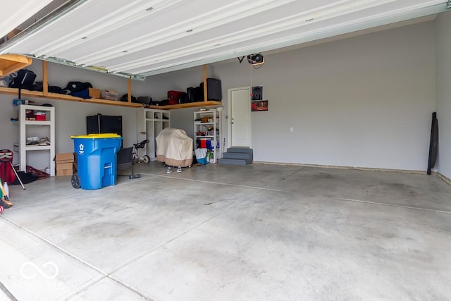 garage featuring a garage door opener