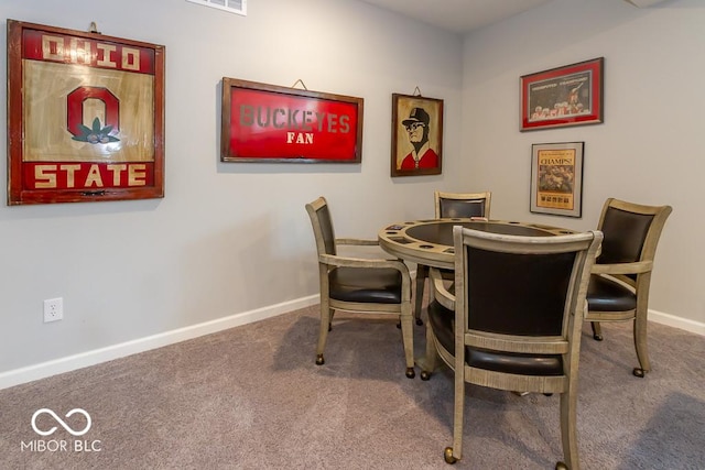 dining room with carpet floors