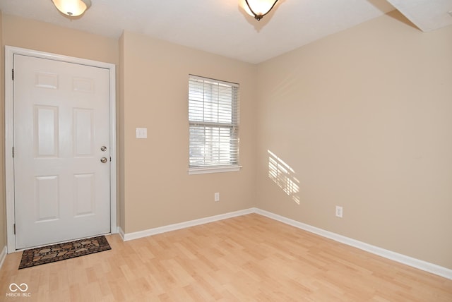 entrance foyer with light hardwood / wood-style flooring