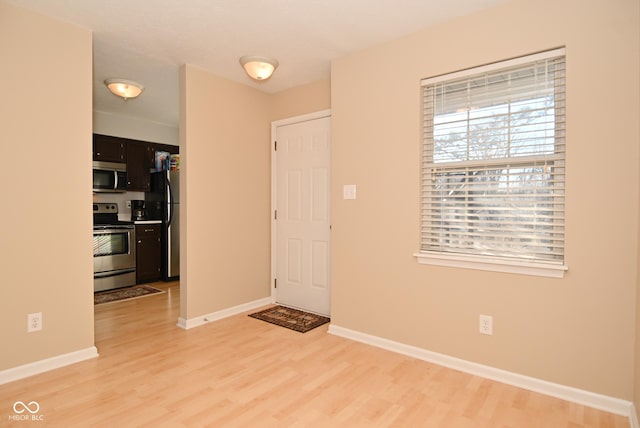 foyer entrance featuring hardwood / wood-style flooring