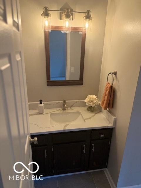 6639 N College Ave, Indianapolis, IN 46220 - bathroom with vanity and tile patterned floors
